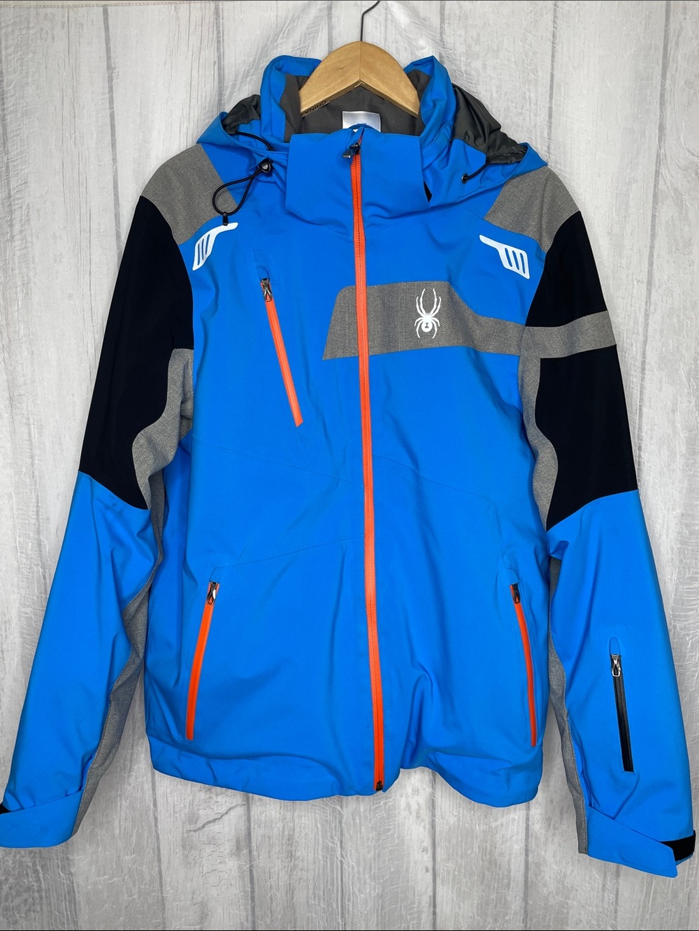 Spyder Men’s Blue Ski Jacket with Orange Zippers and Gray/Black Accents